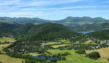 Panoramic view of Lake Chambon and the Sancy massif in the Auvergne Volcanoes Regional Natural