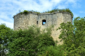 Medieval 13th century castle in Montaigu-le-Blin, showcasing impressive fortifications and