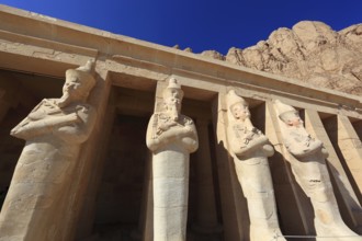 Part of the temple complex, statues of Hatshepsut at the mortuary temple of Hatshepsut, Hatshepsut