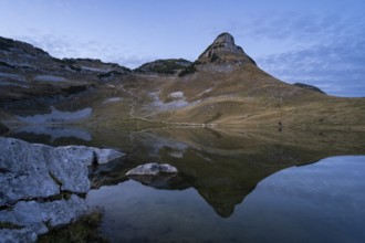 Lake Augstsee and the Atterkogel mountain on the Loser. Autumn, good weather, blue sky. In the