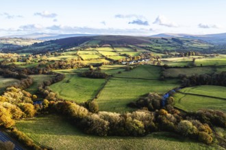 Farms over Trecastle from a drone at sunset, Brecon Beacons National Park, Powys, Wales, England,