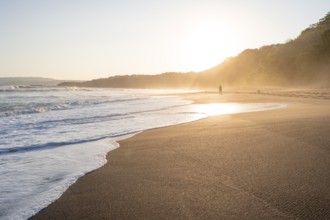 Sandy beach beach and sea at sunset, Playa Cocalito, coastal landscape, Pacific coast, Nicoya