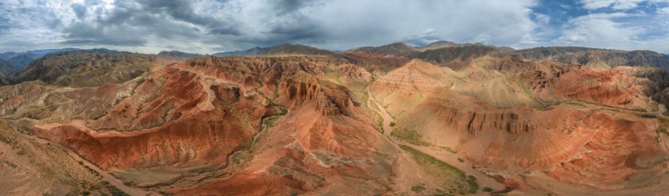 Panorama, Eroded mountain landscape, Canyon with red and orange rock formations, Aerial view,