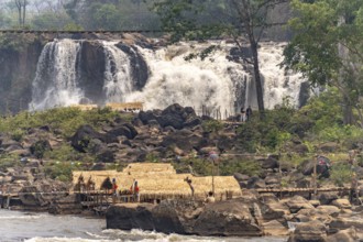 Huts at the Tad Lo waterfall in the Bolaven Plateau near Ban Saenvang, Laos, Asia