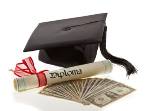 A doctor's hat and dollar bills, symbol of education costs in America, tuition fees, Vienna,