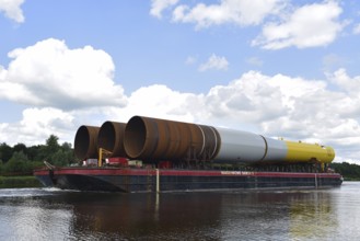 Tugboat pulling parts of an offshore wind turbine through the Kiel Canal, Kielkanal,