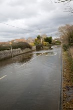 Flooding on the Somerset Levels, England in February 2014 River Yeo at Huish Episcopi flooded A372