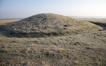 Bronze Age bowl barrow on Windmill Hill, a Neolithic causewayed enclosure, near Avebury, Wiltshire,