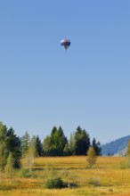 Hot air balloon over the Rothenthurm high moor in the canton of Schwyz, Switzerland, Europe