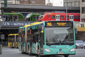 Local transport, junction at the main railway station, local trains, city bus, in the city centre