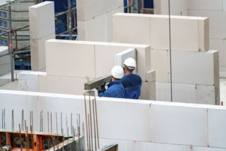 Construction site, new construction of apartment blocks, shell construction, North