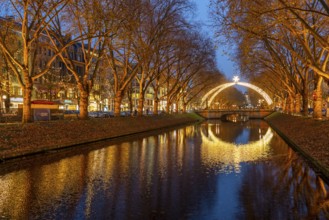 Königsallee, Kö, elegant shopping street in the city centre of Düsseldorf, arc of light over the