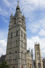 Belfry, and tower of St Bavo's Cathedral, also Sint-Baafskathedraal (behind), UNESCO World Heritage