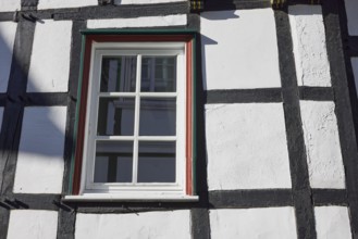 Timber framing with windows on a house in the historic centre of Hattingen, Ennepe-Ruhr district,