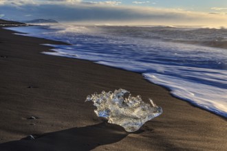 Ice floes on the beach, waves, sunny, morning mood, winter, Diamond Beach, Breidamerkursandur,