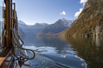 Tourist boat on the Königssee, Watzmann massif, autumnal mountain landscape reflected in the lake,