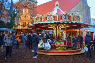 Children's carousel at Christmas market in Flensburg, Schleswig-Holstein, Germany, Europe