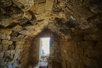 Architectural details of an ancient interior with stones and play of light, tomb of Cleovoulos the