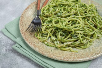 Spaghetti with pesto sauce, homemade, no people