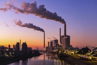 Mannheim coal-fired power station on a cold winter's day, plumes of smoke above the chimneys.