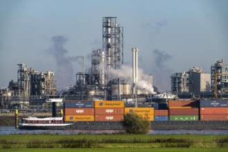 Cargo ship on the Rhine near Emmerich, Kao Chemicals backdrop, specialising in surfactants, KLK,