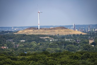 View of the Mottbruch spoil tip in Gladbeck, with wind turbine, from the Haniel spoil tip, lNorth