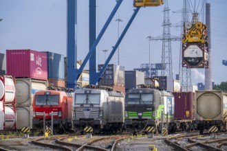 Locomotives of container trains, in Duisburg harbour, Logport, goods trains being loaded, part of