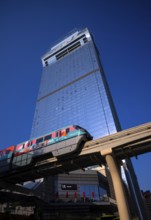 Monorail in front of The View At The Palm Hotel, Traffic, The Palm Jumeirah, Dubai, United Arab