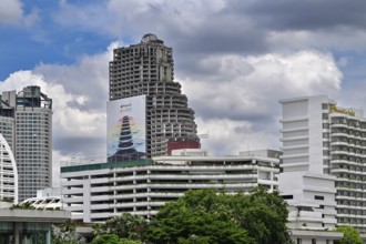 Sathorn Unique Tower with iphone advert, Bangkok, Thailand, Asia