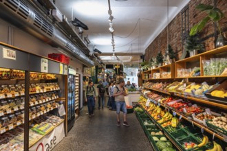 Fruit and vegetable stalls in the Freiburg market hall in the historic city centre of Freiburg im