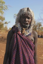 South Ethiopia, in Maco National Park, Mursi tribe, young Mursi woman, plate-lipped woman, woman