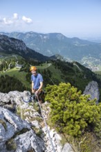 Climber on a climbing tour, alpine climbing, crossing the Kampenwand, Chiemgau, Bavaria, Germany,