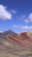 Peru, Cusco scenic landscape Rainbow mountain of 7 colors near Sacred Valley and Ausangate Glacier,