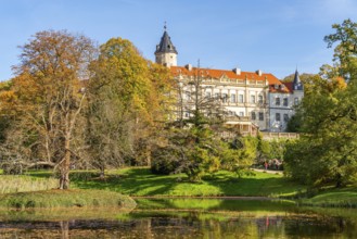 Wiesenburg Castle and Castle Park with pond and colourful leaves in autumn, Wiesenburg Castle Park,