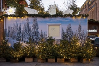 Container decorated and festooned for Christmas at the ice rink on the Christmas market,