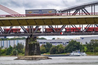 The Beeckerwerth Rhine bridge of the A42 motorway, truck traffic, in front of it the Haus-Knipp