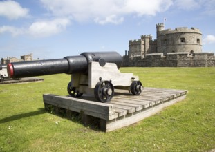 Cannon and historic buildings at Pendennis Castle, Falmouth, Cornwall, England, UK