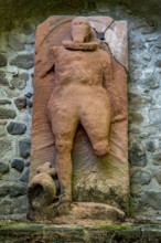 Medieval grave slab, gravestone for a nobleman, burgrave, weathered relief in red sandstone, castle