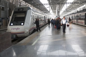 Train at platform inside María Zambrano railway station Malaga, Spain, Europe