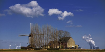 Historic Düppelsmühle, trestle windmill on a ridge near Titz in front of the Neurath power station,