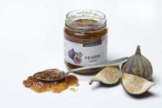 Fig jam in a jar and spoon with fig jam, fresh figs, Ficus carica