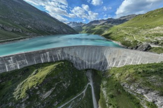 Dam of the Moiry lake, Lac de Moiry, turquoise glacial water, aerial view, Valais, Switzerland,