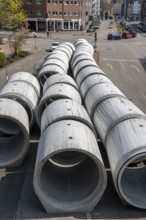 Concrete sewer pipes, stored on a construction site during sewer renovation work, on the Dickswall,