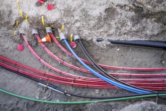 Power cables, electrical cables, supply cables, in a construction pit, were newly laid, power