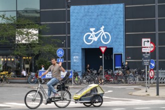 Cyclists on cycle paths, bicycle parking garage at the Fisketorvet shopping centre, Sydhavnen, in