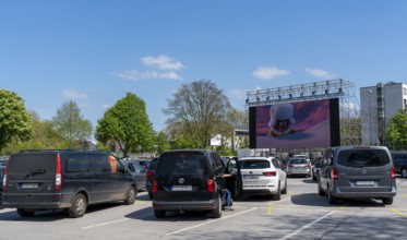 Temporary drive-in cinema, in the car park in front of Messe Essen, Grugahalle, large LED screen