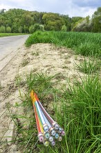 Fibre optic cable, freshly laid along a dirt road, provision of high-speed Internet in rural areas,