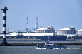 LNG import terminal tanks for liquefied natural gas in the seaport of Rotterdam, freighter, the