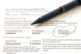 Symbolic image of electricity bill, billing of an electricity provider, additional payment due to