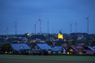 Wind farm above the village of Lichtenau, self-proclaimed energy town, houses with photovoltaic